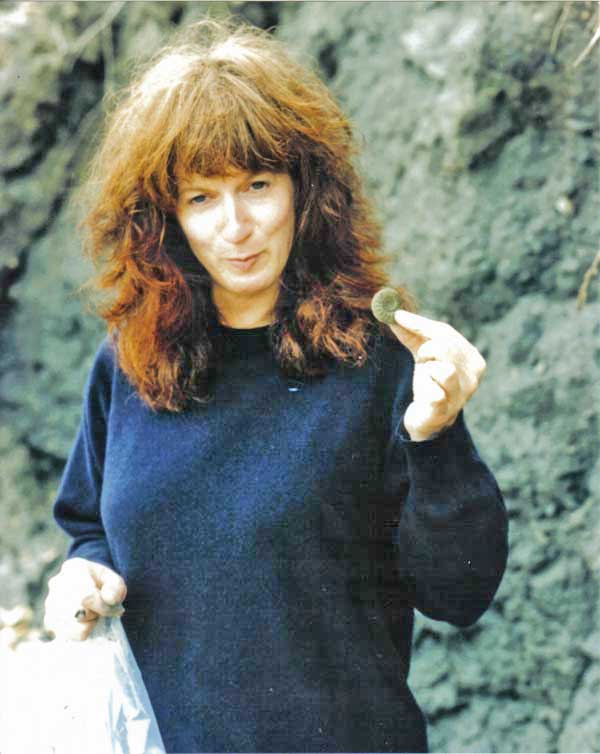 Penny M at Lyme Regis with giant ammonite, clearly following in the footsteps of Mary Anning.
