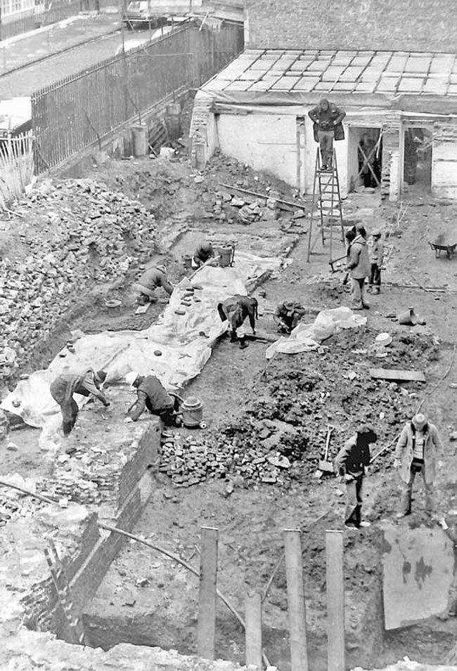 Photographer Trevor Hurst about to take the plunge on Bridewell Palace in 1978, with Ian Blair and supervisor Derek Gadd at bottom right vainly attempting to levitate a shovelling board using mind power alone.  Photo: Lez Watson