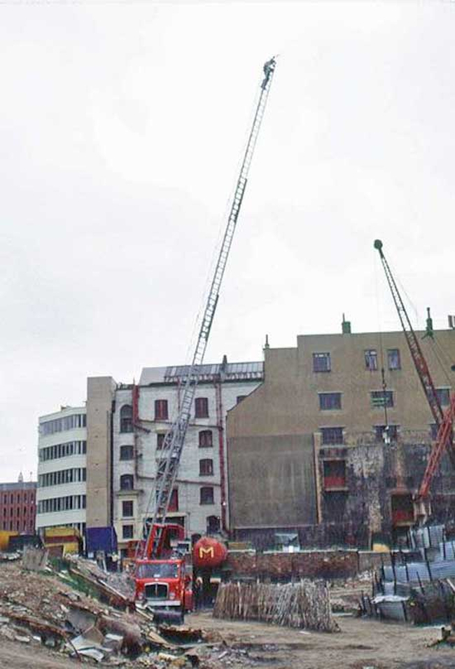 Rising to even greater heights No.1: Jamie Muir at the top of Fire engine ladder (looking east)
