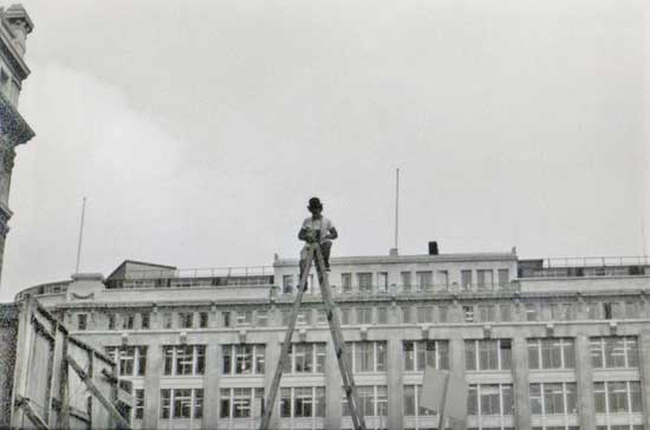 Dashing archaeologist/photographer Ken Dash resplendent in a bowler hat on GPO Newgate Street in 1975.